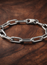 Pandora ME Medium-Link Chain Bracelet — display on walnut
