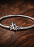 Pandora Moments Asymmetric Star T-bar Snake Chain Bracelet — display on walnut