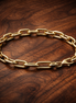 Small-Link Chain Bracelet — display on walnut