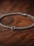Pandora Signature Pavé Bold Chain Bracelet — display on walnut