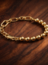 Pandora ME Metal Bead & Link Chain Bracelet — display on walnut