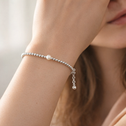 Treated Freshwater Cultured Pearl & Beads Bracelet — worn on wrist