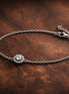 Sparkling Pear Halo Chain Bracelet — display on walnut