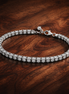 Sparkling Bold Tennis Bracelet — display on walnut