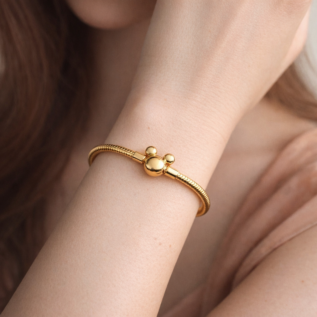 Disney Mickey Mouse Clasp Moments Snake Chain Bracelet — worn on wrist
