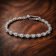 Bow Chain Bracelet — display on walnut