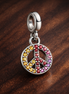 Pink Mosaic Peace Pendant - Pink Peace Sign Mosaic Charm — display on walnut