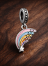 Pastel Rainbow Dangle - Pastel Rainbow Cloud Charm — display on walnut