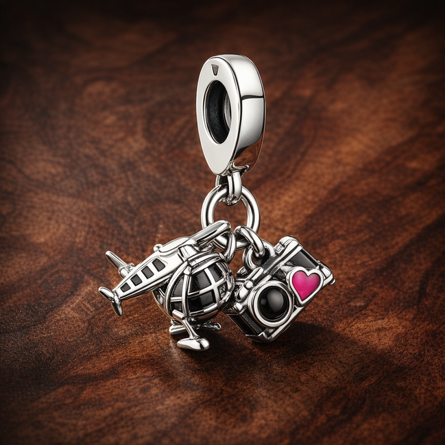 Airplane, Globe & Suitcase Dangle Charm — display on walnut
