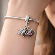 Airplane, Globe & Suitcase Dangle Charm — worn on wrist