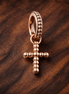 Rose Gold Plated Cross Charm - Rose Gold Plated Beaded Cross Charm — display on walnut
