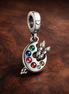 Artist Palette Charm - Colorful Artist Palette Dangle Charm — display on walnut