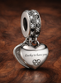 Lucky Heart Charm - Silver Lucky Heart Dangle Charm — display on walnut
