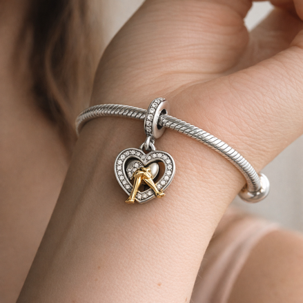 Two-tone Happy Anniversary Dangle Charm — worn on wrist