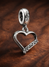 Silver Open Heart Script Charm - Silver Script Open Heart Charm — display on walnut