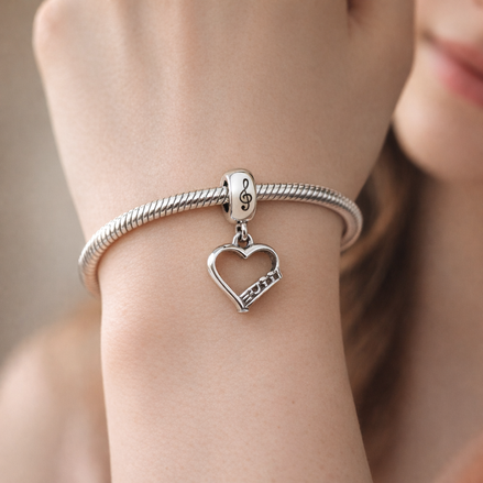 Silver Open Heart Script Charm - Silver Script Open Heart Charm — worn on wrist