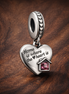 Home in the Heart Charm - Home Is Where the Heart Is Charm — display on walnut