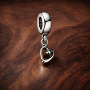 Stethoscope Heart Dangle Charm — display on walnut
