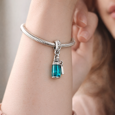 Blue Perfume Bottle Charm - Teal Perfume Bottle Dangle Charm — worn on wrist