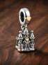 & Gold Plated Fairy Tale Castle - Sterling Silver & Gold Plated Fairy Tale Castle Dangle Charm — display on walnut