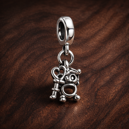 Key & Lock - Sterling Silver Key & Lock Dangle Charm — display on walnut