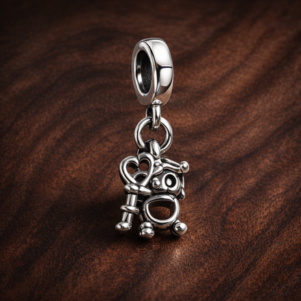 Key & Lock - Sterling Silver Key & Lock Dangle Charm — display on walnut