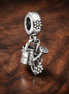 Gardening Tools Charm - Silver Garden Tools Dangle Charm — display on walnut