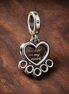 Hearts & Paw Print Dangle Charm — display on walnut