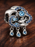 Blue Elephant Rain Charm - Elephant Cloud Rain Charm — display on walnut