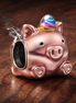 Flying Unicorn Pig Charm — display on walnut