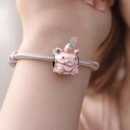 Flying Unicorn Pig Charm — worn on wrist
