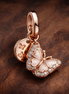 Pink Butterfly & Quote Double Dangle Charm — display on walnut