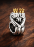 Darth Vader Crown Charm - Darth Vader-Inspired Crowned Heart Charm — display on walnut