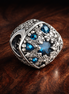 Blue Starburst Bead - Navy Starburst Crystal Bead — display on walnut