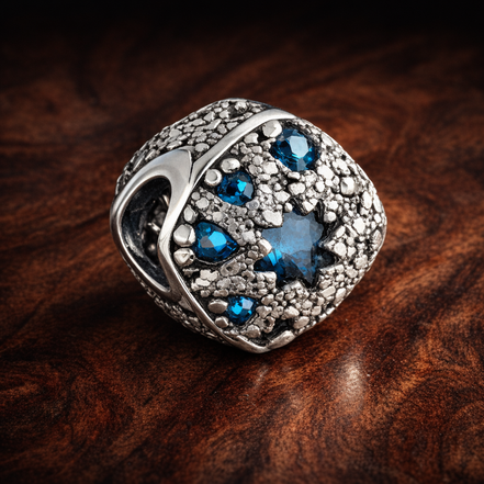 Blue Starburst Bead - Navy Starburst Crystal Bead — display on walnut