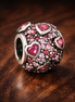 Pink Hearts Bead - Pink Heart Pavé Bead — display on walnut
