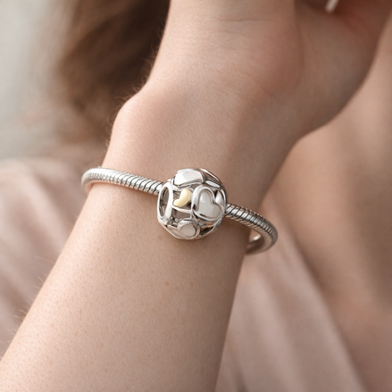 White Heart Window Bead - White Enamel Heart Window Charm — worn on wrist