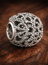 Silver Floral Vine Bead - Silver Floral Vine Sparkle Charm — display on walnut