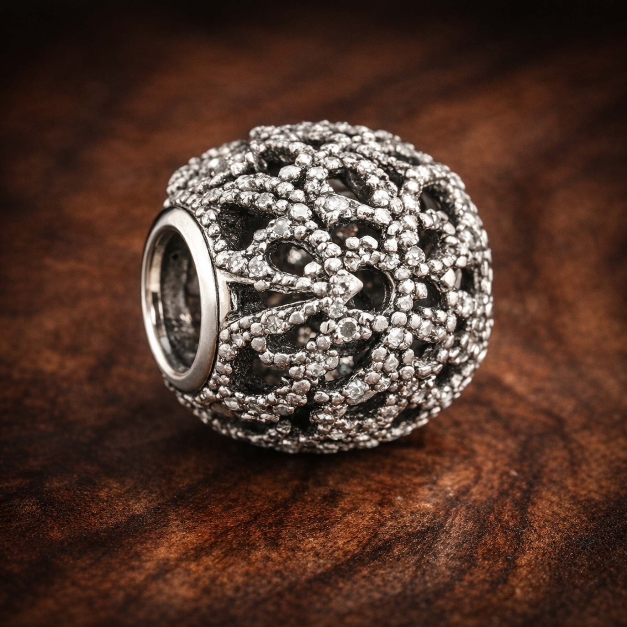Silver Floral Vine Bead - Silver Floral Vine Sparkle Charm — display on walnut