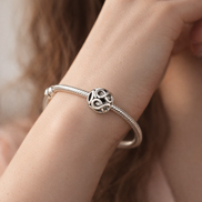 Silver Infinity Knot Bead - Silver Infinity Loop Charm — worn on wrist