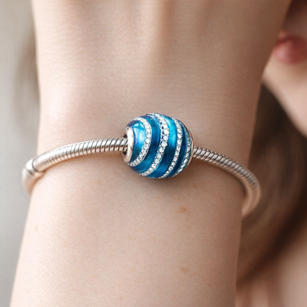 Blue Ribbed Sparkle Bead - Blue Ribbed Enamel Sparkle Bead — worn on wrist