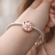 Pink Flower Enamel Bead - Pink Flower Enamel Charm — worn on wrist