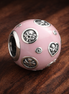 Pink Travel Patch Bead - Pink Travel Patch Charm — display on walnut