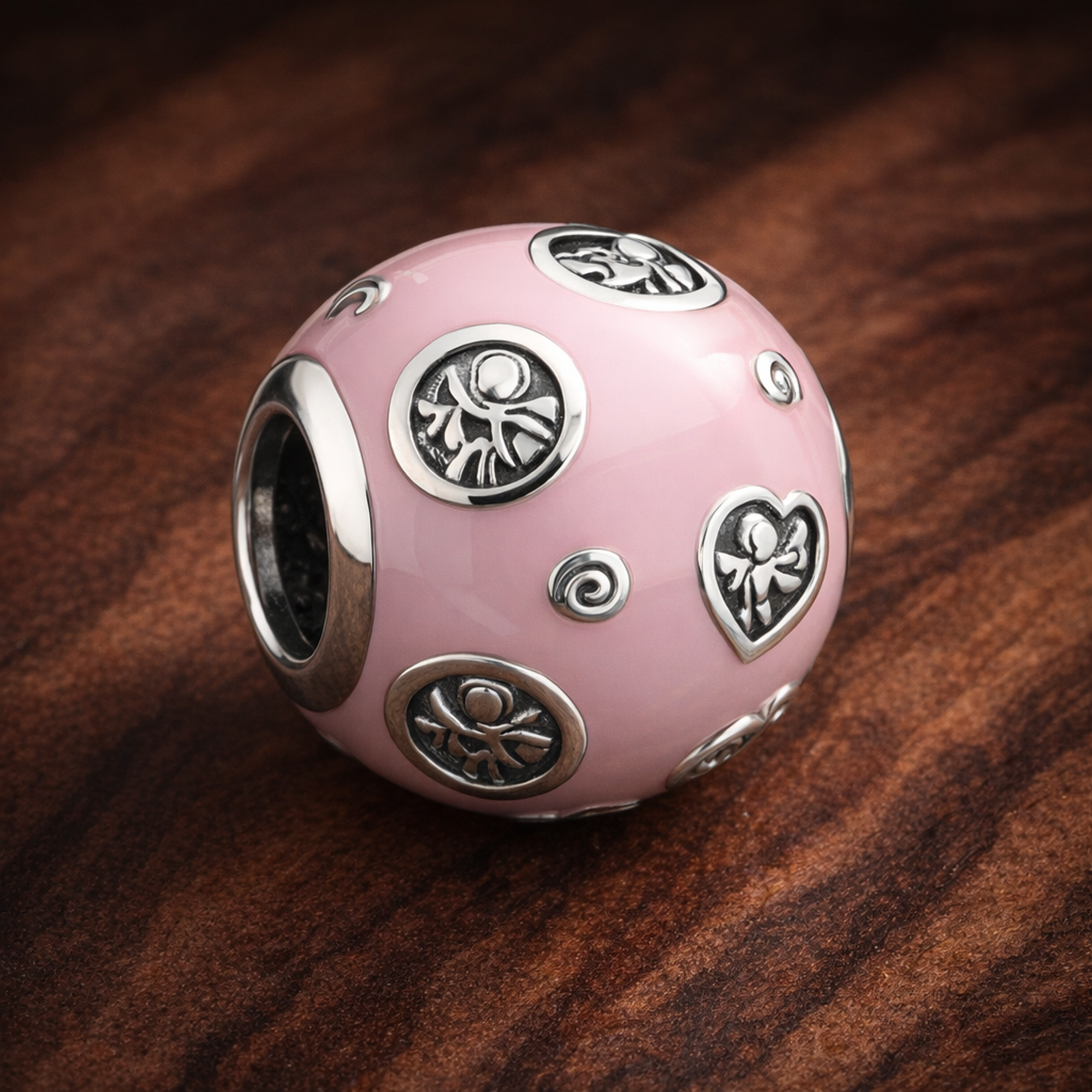 Pink Travel Patch Bead - Pink Travel Patch Charm — display on walnut