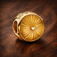 Golden Sunburst Heart Bead - Gold Plated Sunburst Heart Charm — display on walnut