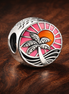 Red Graphic Enamel Bead - Red Graphic Pop Enamel Charm — display on walnut