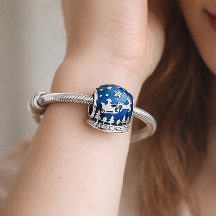 Santa Sleigh Night Bead - Blue Santa Sleigh Winter Charm — worn on wrist