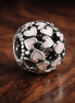Pink Heart Petal Bead - Pink Heart Petal Cluster Charm — display on walnut