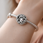 Holiday Wreath Character Bead - Christmas Character Wreath Charm — worn on wrist