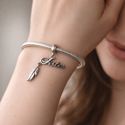 Sister Heart Charm — worn on wrist